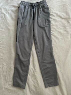 Reebok Men's Light Gray Athletic Joggers with Black Drawstring